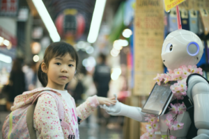 A young girl holds hands with a human-like robot