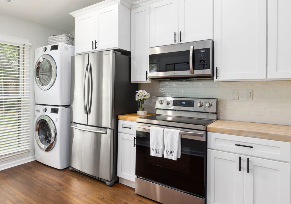 A photo of a kitchen with stainless steel appliances